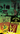 Collection of album covers with prominent text and graphics on a colourful background.