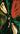 A stylized, distorted portrait artwork showing multiple Beatles faces with dark green hair against a black background, plus a large red abstract shape in the upper right.